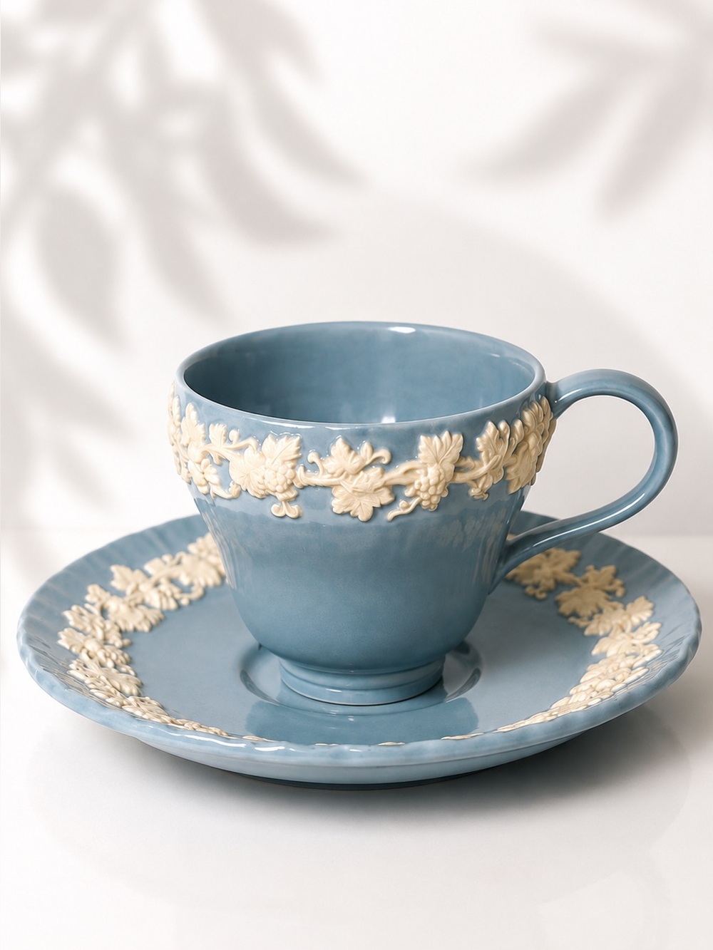 Wedgwood Etruria Barlaston Embossed Queensware Blue Tea Cup & Saucer Set England